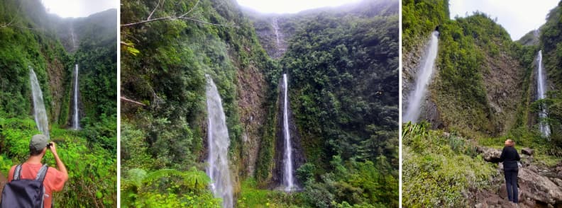Cascadele de Bras d’Anette pe coasta de est a insulei Reunion, cu două căderi de apă înalte pe versanți verzi abrupți, observate de pe potecă montană.