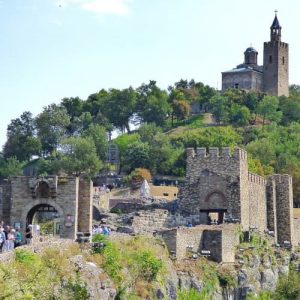 Day Trip to Bulgaria Veliko Tarnovo. Medieval stone fortress and historic buildings on a hillside in Veliko Tarnovo Bulgaria