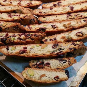 Florence food tour. Slices of Tuscan cantucci biscuits with almonds and dried fruit displayed on a tray