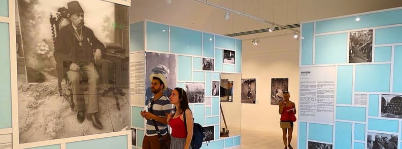 Marubi National Museum of Photography Shkoder Albania Visitors exploring the Marubi National Museum of Photography in Shkodër, Albania, surrounded by historic black-and-white photographs and modern exhibition panels.