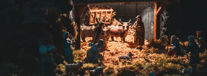 Traditional nativity scene with figurines of Mary Joseph animals and baby Jesus in Madrid