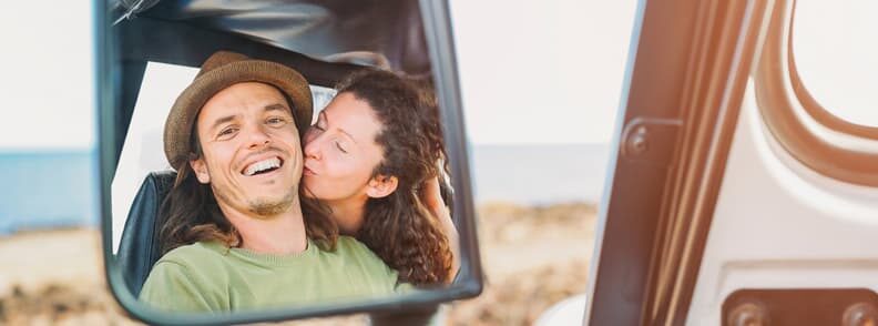 happy couple on road trips in Europe