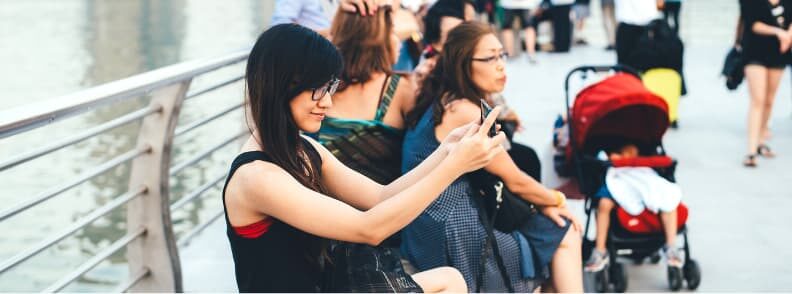 solo female traveler taking a selfie