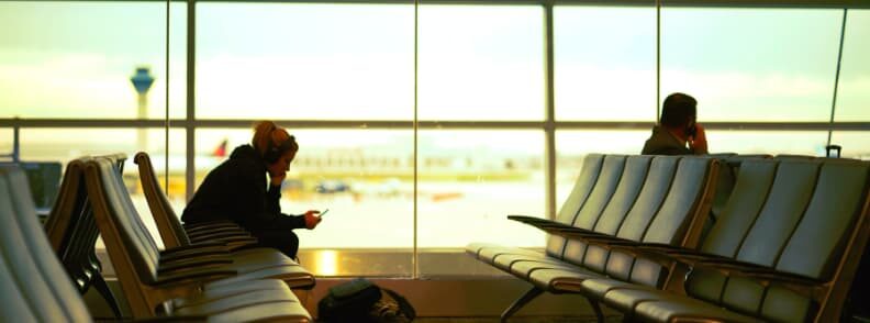 woman waiting in airport on Christmas