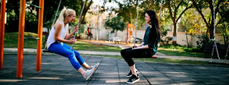 women talking about their travels