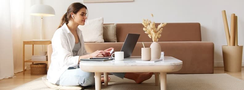 woman doing the online check in before  heading to the airport