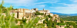 Life in a French village in Provence. Traditional hilltop village in the South of France with stone houses and green valley