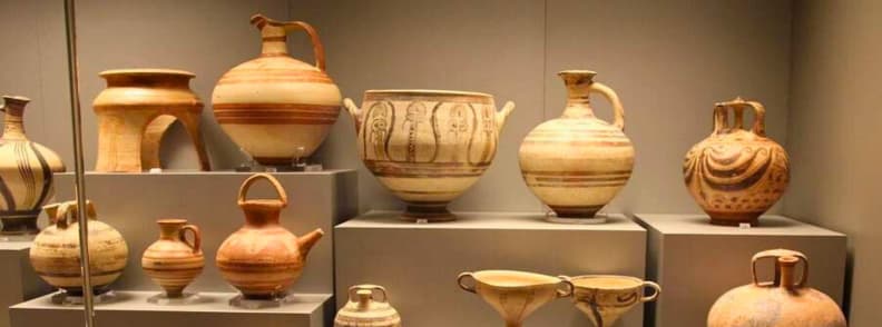 Ancient Greek pottery collection at the National Archaeological Museum of Athens Display of ancient Greek pottery at the National Archaeological Museum in Athens, showcasing artifacts from prehistoric to classical periods