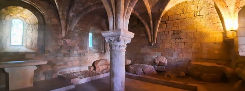 Chapter House at Abbaye du Thoronet Medieval Cistercian Provence Stone chapter house at Abbaye du Thoronet in Provence with vaulted ceilings, central column, arched windows, and stone benches