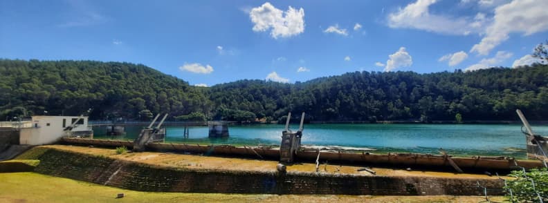 Lac de Carces Dam Reservoir Provence Verte 1 Lac de Carcès dam with turquoise reservoir water and forested hills in Provence Verte