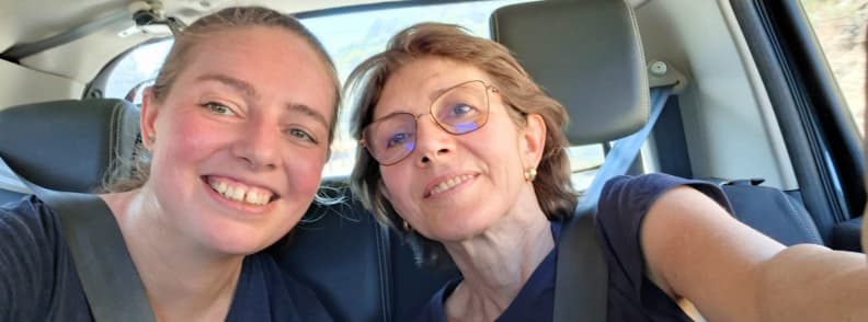 Mirela Letailleur The Travel Bunny and Doina Vaduva post hike smiles Saint Raphael Esterel Massif car ride Mirela Letailleur The Travel Bunny and Doina Vaduva. Mother and daughter taking a selfie with seatbelts on after completing the Ravin du Gratadis to Col d Aubert loop in the Esterel Massif near Saint Raphael