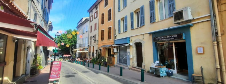 Restaurants on Rue Marechal Foch in Carces Dining Near Eglise Sainte Marguerite Colorful façades and restaurant terraces along Rue Maréchal Foch near Église Sainte-Marguerite in Carcès