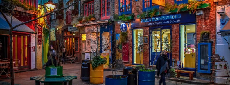 Evening view of colorful shops and Neal’s Yard in Covent Garden London