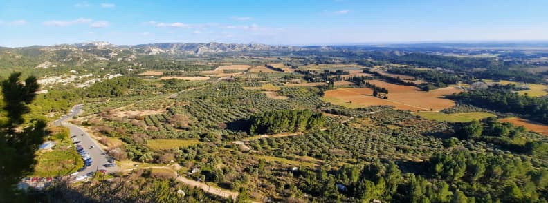 Aerial view of olive groves and roads leading to Les Baux-de-Provence in the Alpilles countryside