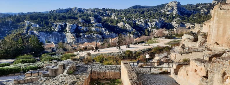 Panoramic view from the Château des Baux-de-Provence overlooking the Val d’Enfer cliffs and the Alpilles landscape