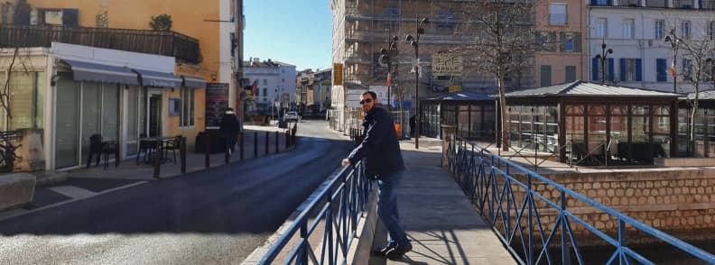 Mathieu Letailleur Martigues winter weather Etang de Berre Provence climate Mathieu Letailleur standing on a sunny bridge in Martigues on a clear winter day, showing bright skies and mild Provençal weather by the Étang de Berre.