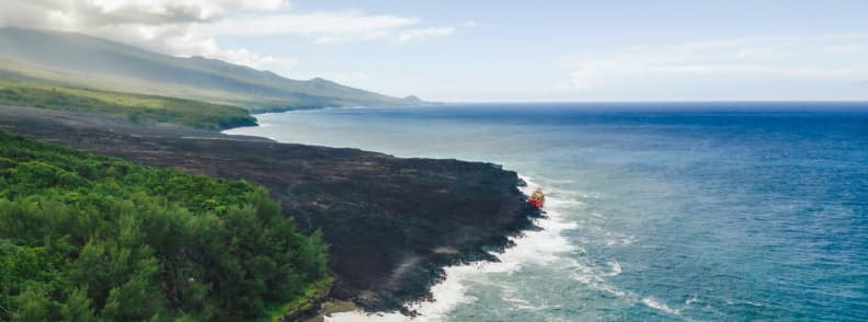 Tresta Star shipwreck on basalt lava cliffs along Route des Laves Reunion East Coast