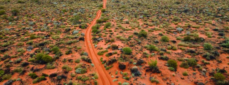Outback survival gear list remote desert road in Australian Outback from above