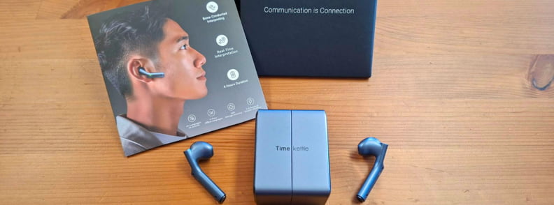 Timekettle W4 AI Interpreter Earbuds with charging case and packaging showing final review setup for travel translation earbuds.