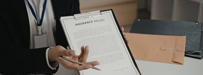 checking travel insurance policy details before buying short trip coverage