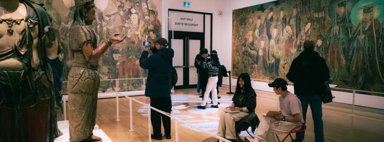Royal Ontario Museum Toronto Two Day Couples Itinerary Visitors exploring art and cultural exhibits inside the Royal Ontario Museum during a two-day Toronto itinerary.
