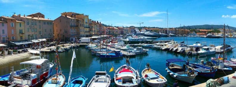 Saint Tropez Old Port French Riviera Cote d Azur Boats and yachts moored in the Vieux Port of Saint-Tropez beside the colorful waterfront buildings of the Côte d’Azur