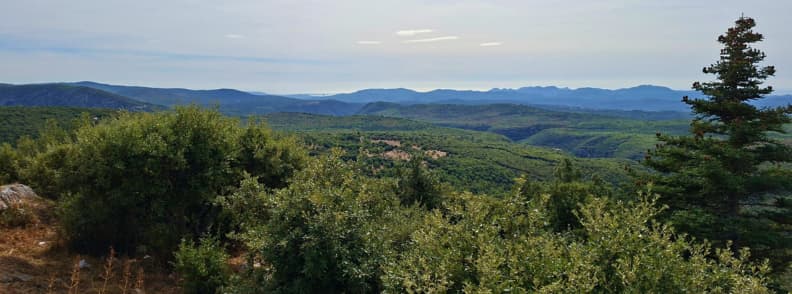 Pays de Fayence September View from Mons to Cannes September view from Mons across the green Pays de Fayence countryside toward the Côte d’Azur, with the Lérins Islands near Cannes visible in the distance.